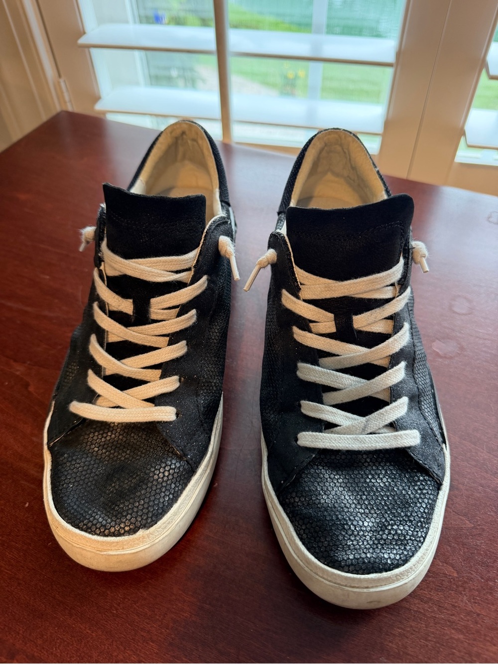 Dolce Vita casual sneakers with mixed media materials and glitter accents.